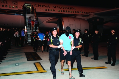 143名嫌疑人从印尼被押解回国