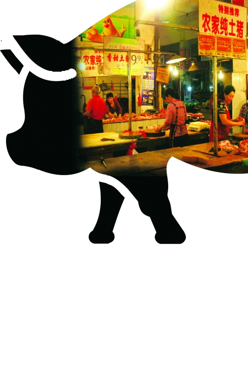 乐群菜市的猪肉档里,3个摊位挂起了"土猪肉"的招牌,而这样的"土